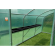 ELEGANT1050G Serre Elegant BxHxL 4,20m x 2,45m x 10,50m (levering) Deze serre heeft een lange levensduur, biedt veel ruimte en is wind- en waterdicht. 
De serre heeft langs beide kanten (voor- en achterkant) een enkele schuifdeur. Deze zorgen voor een makkelijke toegankelijkheid en een goede verluchting.
De serre wordt overtrokken door een groene transparantie PE-folie die ervoor zal zorgen dat uw planten niet zullen verbranden tijdens warm weer.
Voor de plaatsing is er geen fundering nodig, na plaatsing wordt de serre met speciaal meegeleverde grondankers vastgemaakt.

Deze serres kunnen ook geplaatst worden door onze mensen. 
Prijs op aanvraag.
 Serre Elegant